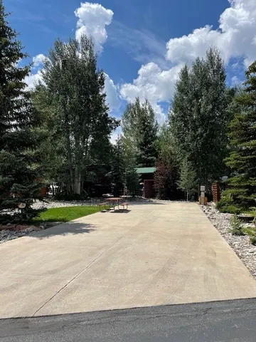 a view of a backyard of the house