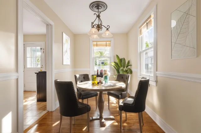 a view of livingroom with hardwood floor and hallway