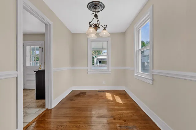 a kitchen with white cabinets