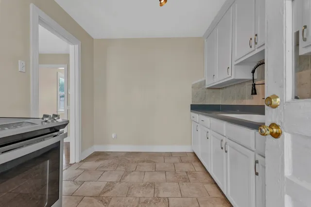 a bedroom that has a bed and a window