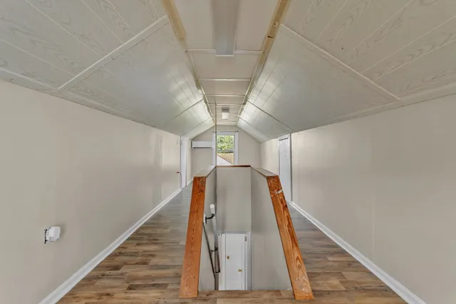 a view of entryway with wooden floor