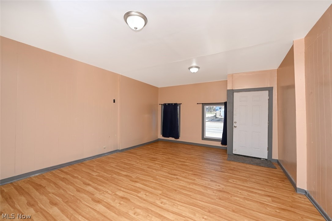 868 North Main Street Akron, OH 44310 - Photo 10 of 30 Unfurnished room featuring light wood-type flooring and baseboards