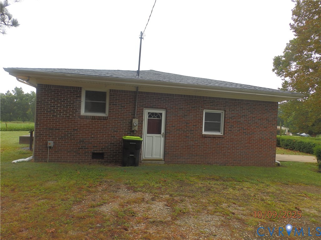 860 Lebanon Road Spring Grove, VA 23881 - Photo 6 of 32 a front view of a house with garden
