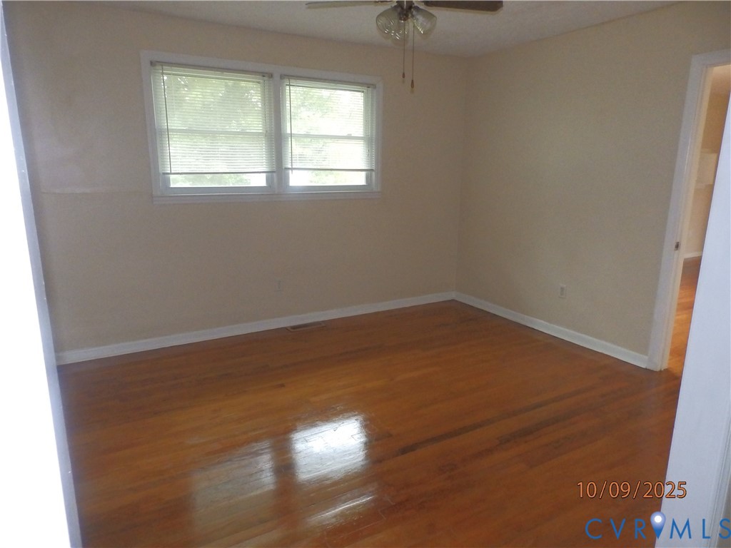 860 Lebanon Road Spring Grove, VA 23881 - Photo 9 of 32 an empty room with a window