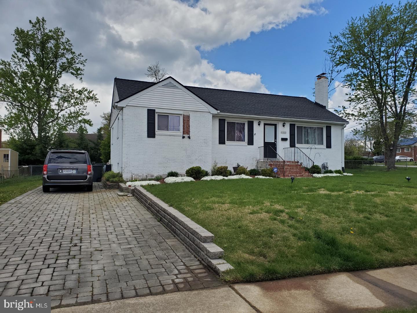 6000 Grayson Street Springfield, VA 22150 - Photo 1 of 37 a front view of a house with a garden