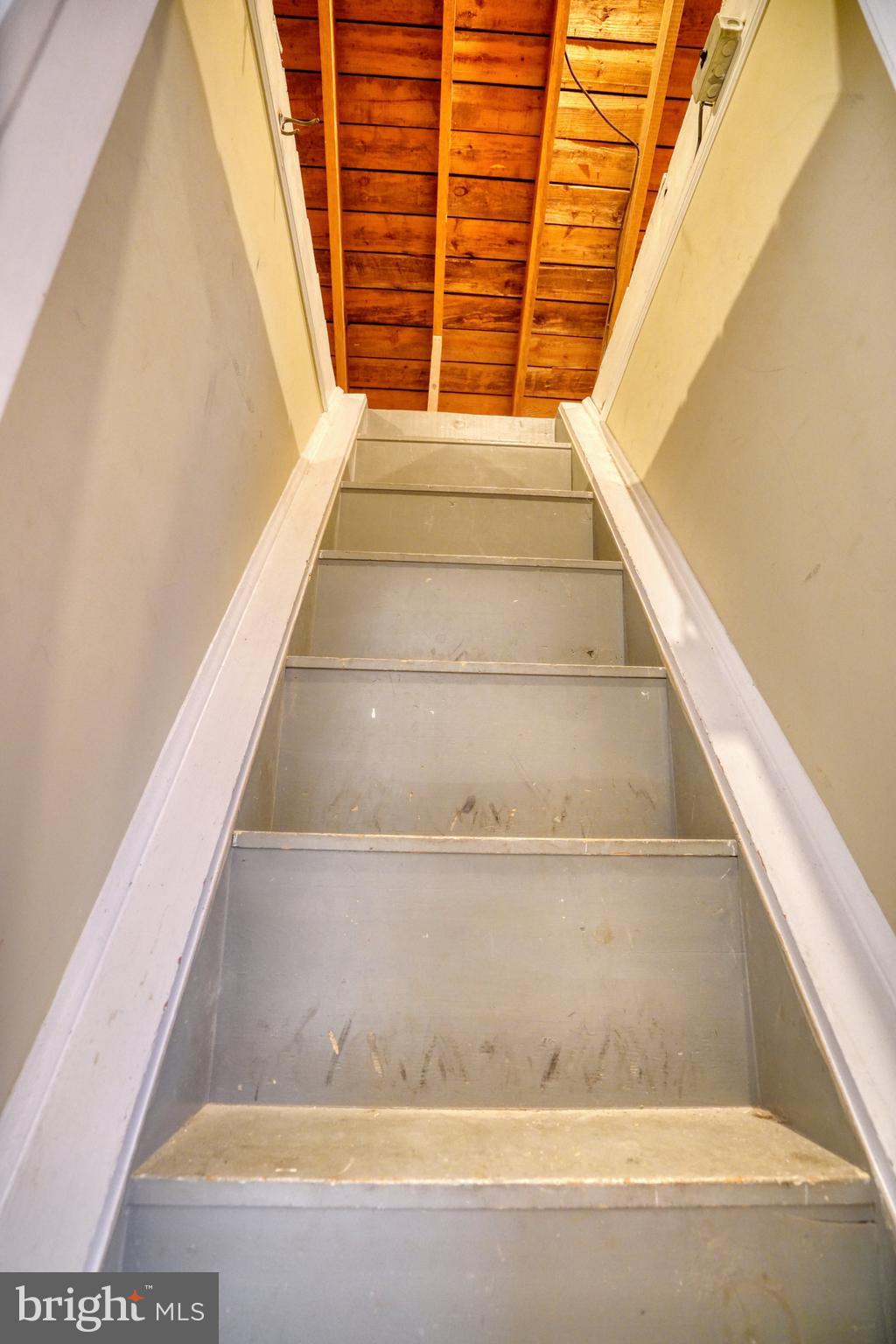 6000 Grayson Street Springfield, VA 22150 - Photo 13 of 37 a view of staircase with white walls and a window