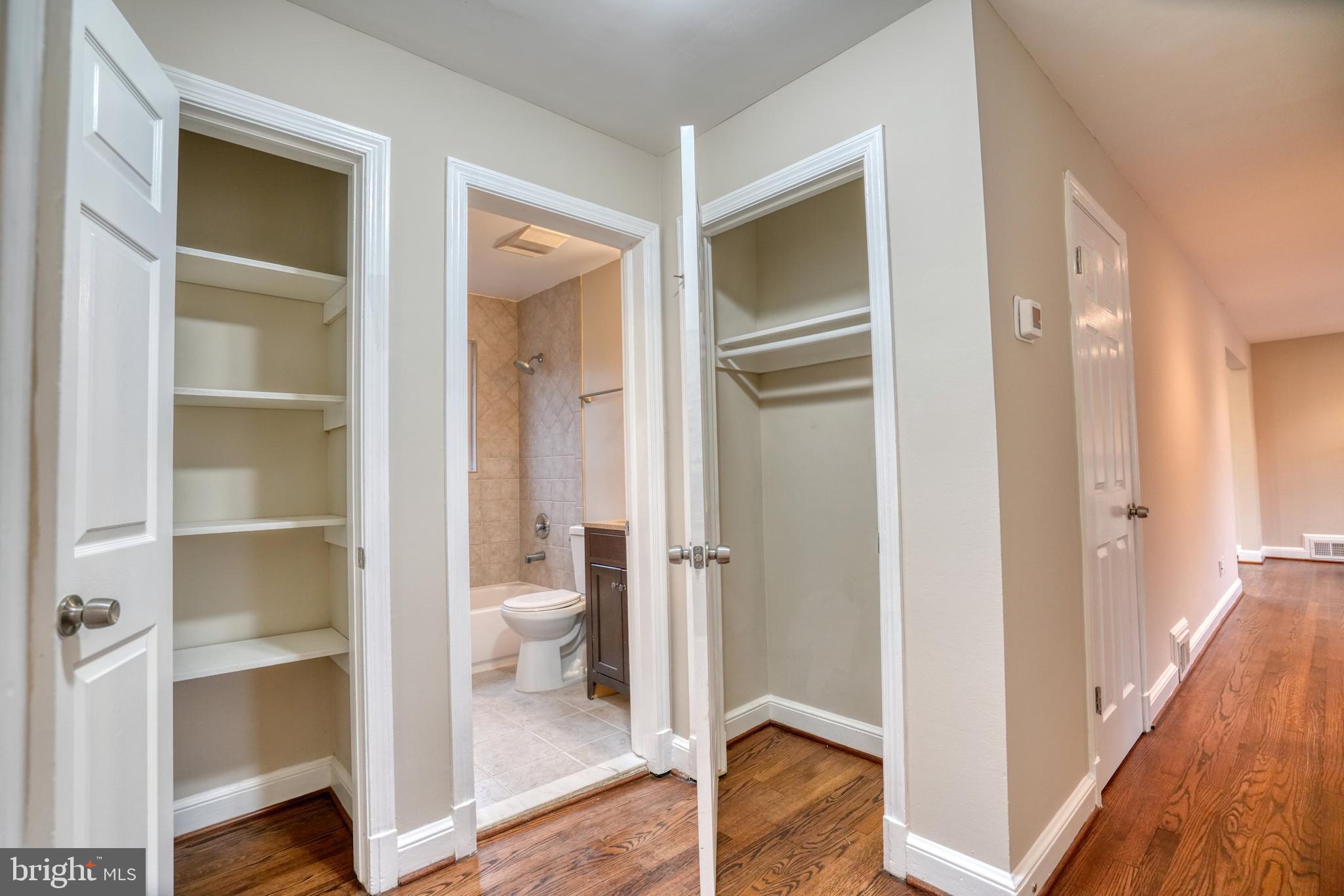6000 Grayson Street Springfield, VA 22150 - Photo 14 of 37 a view of a bathroom from a hallway