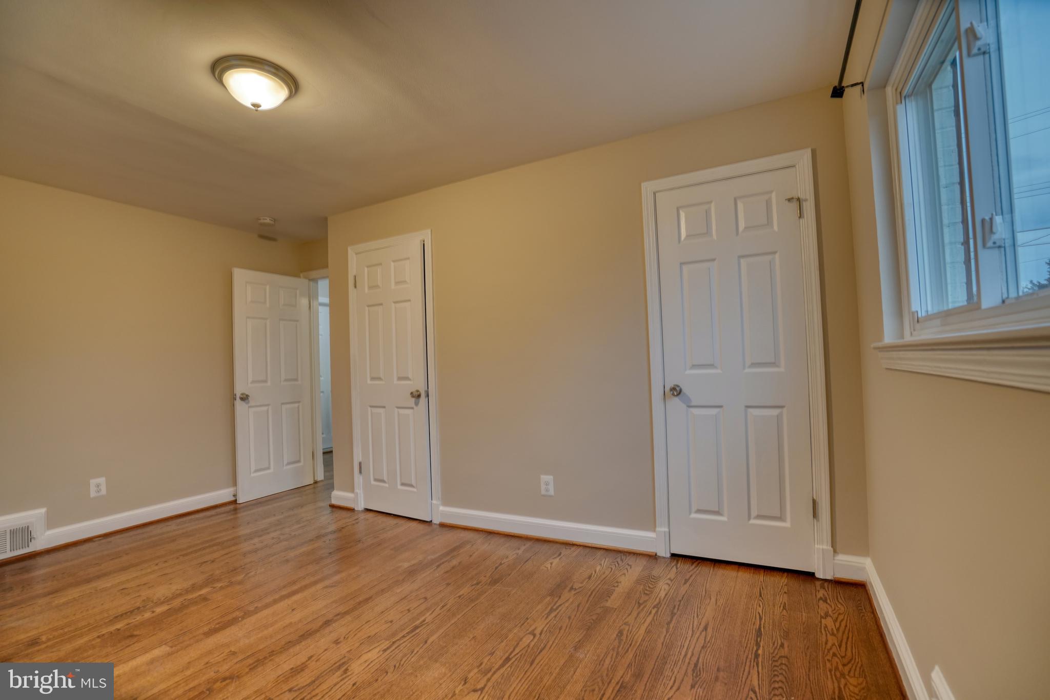 6000 Grayson Street Springfield, VA 22150 - Photo 21 of 37 a view of an empty room with wooden floor
