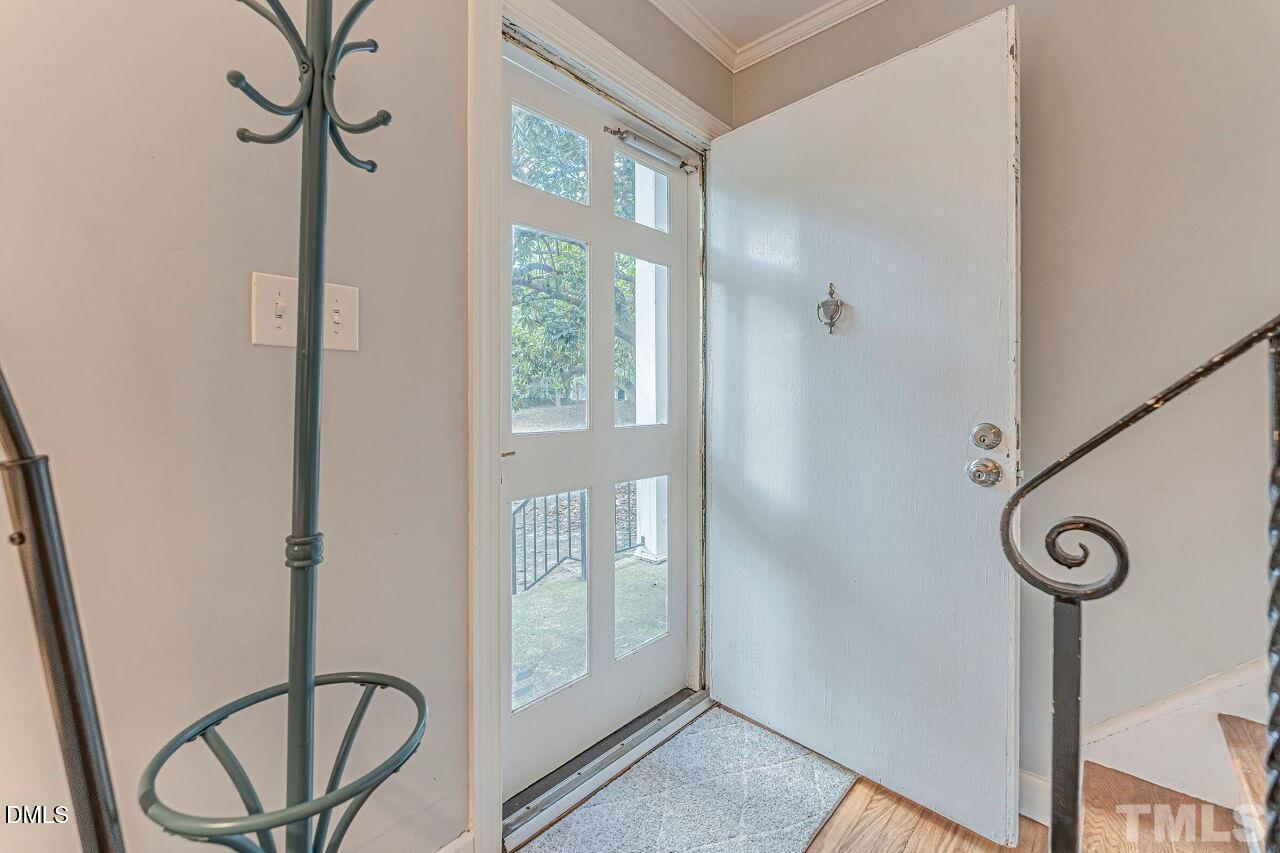 1037 St Marys Street, Unit 1037 Raleigh, NC 27605 - Photo 6 of 36 a view of a hallway with windows
