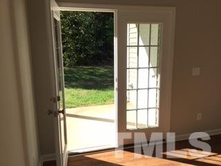 844 Horton Road, Unit 51 Durham, NC 27704 - Photo 6 of 13 a bedroom with a bed and a window