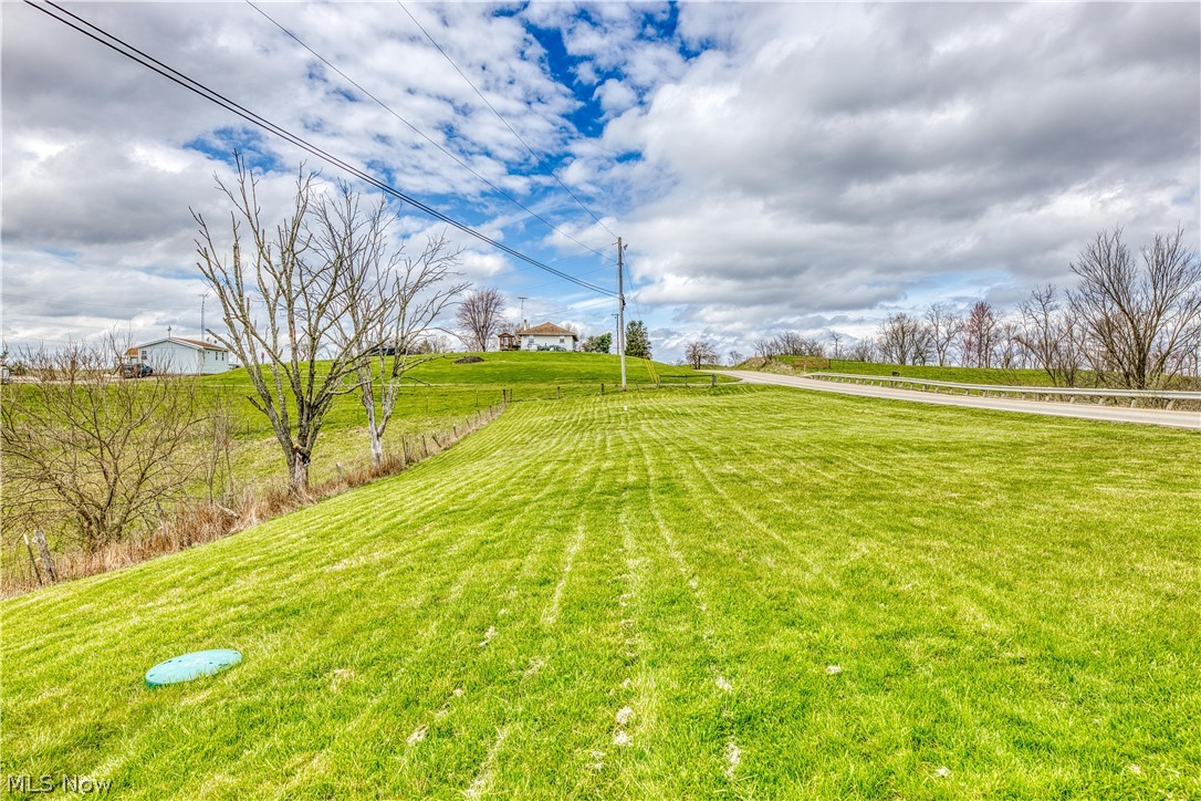 7848 Clay Pike Road Cambridge, OH 43725 - Photo 5 of 12 View of yard with a rural view