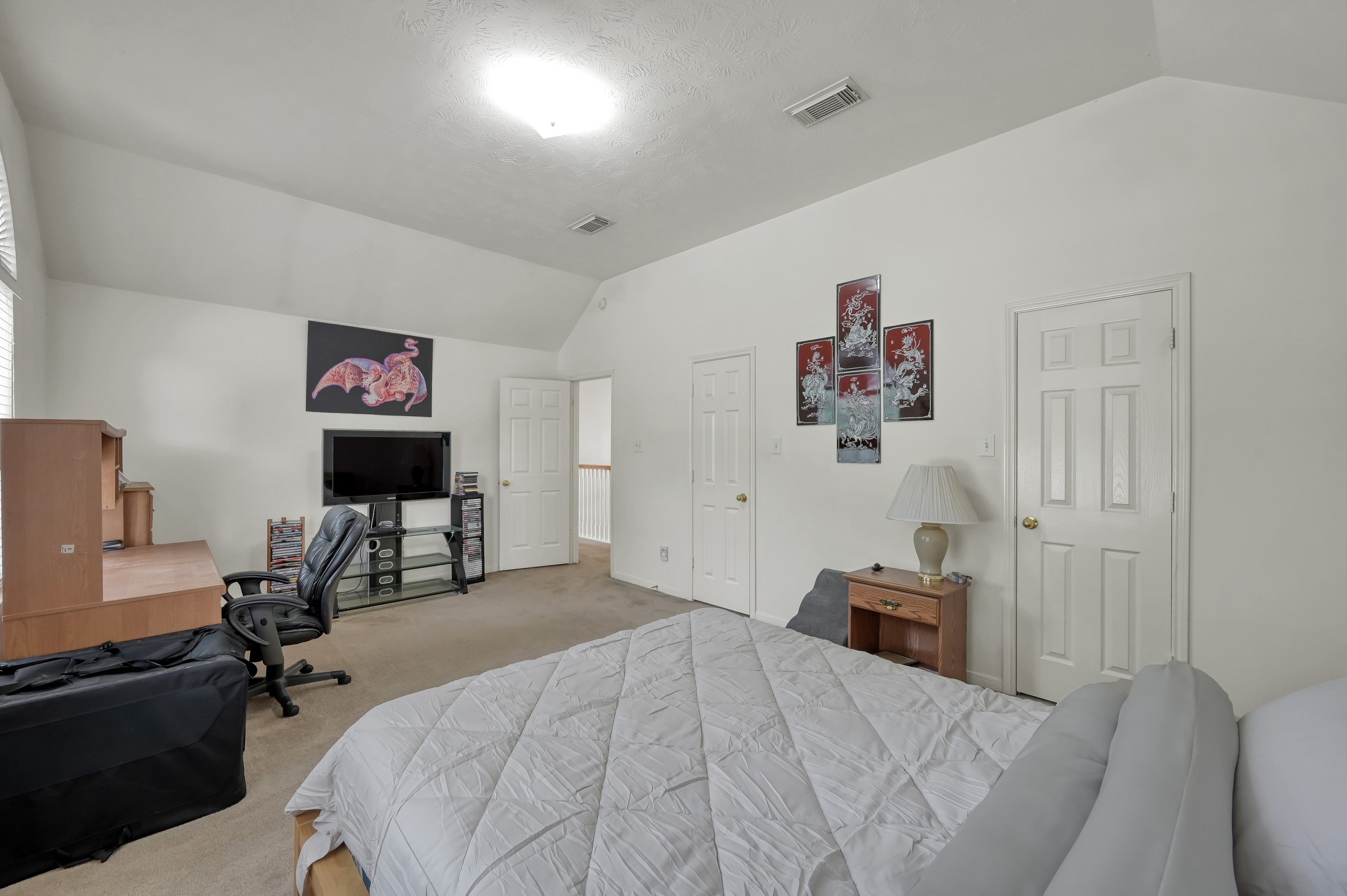 2539 Forge Creek Road Houston, TX 77067 - Photo 32 of 40 Alternate view of the secondary bedroom featuring double closets.