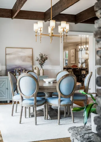 aerial view of a house with a porch and furniture