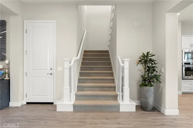 a view of entryway with wooden floor