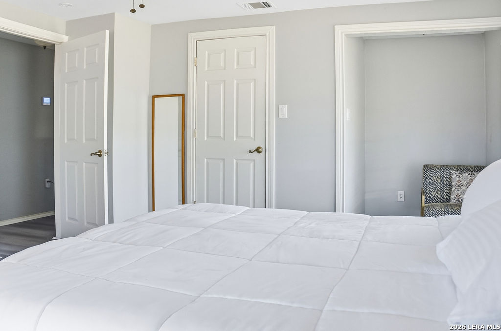 116 Matlock Poth, TX 78147 - Photo 27 of 41 a large white bed in a white bedroom