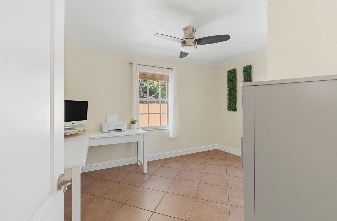 31 Miami Gardens Road West Park, FL 33023 - Photo 13 of 36 a view of a livingroom with a window