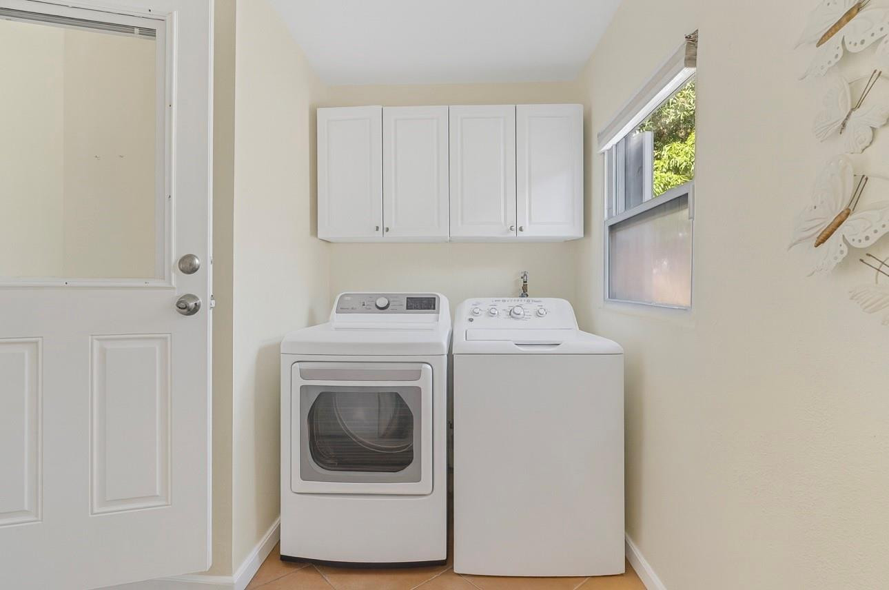 31 Miami Gardens Road West Park, FL 33023 - Photo 16 of 36 a utility room with dryer and washer