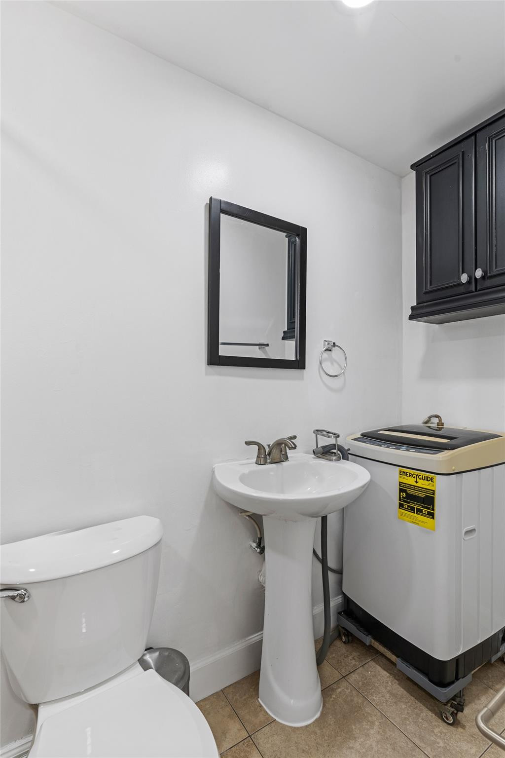 31 Miami Gardens Road West Park, FL 33023 - Photo 18 of 36 a bathroom with a sink and a toilet