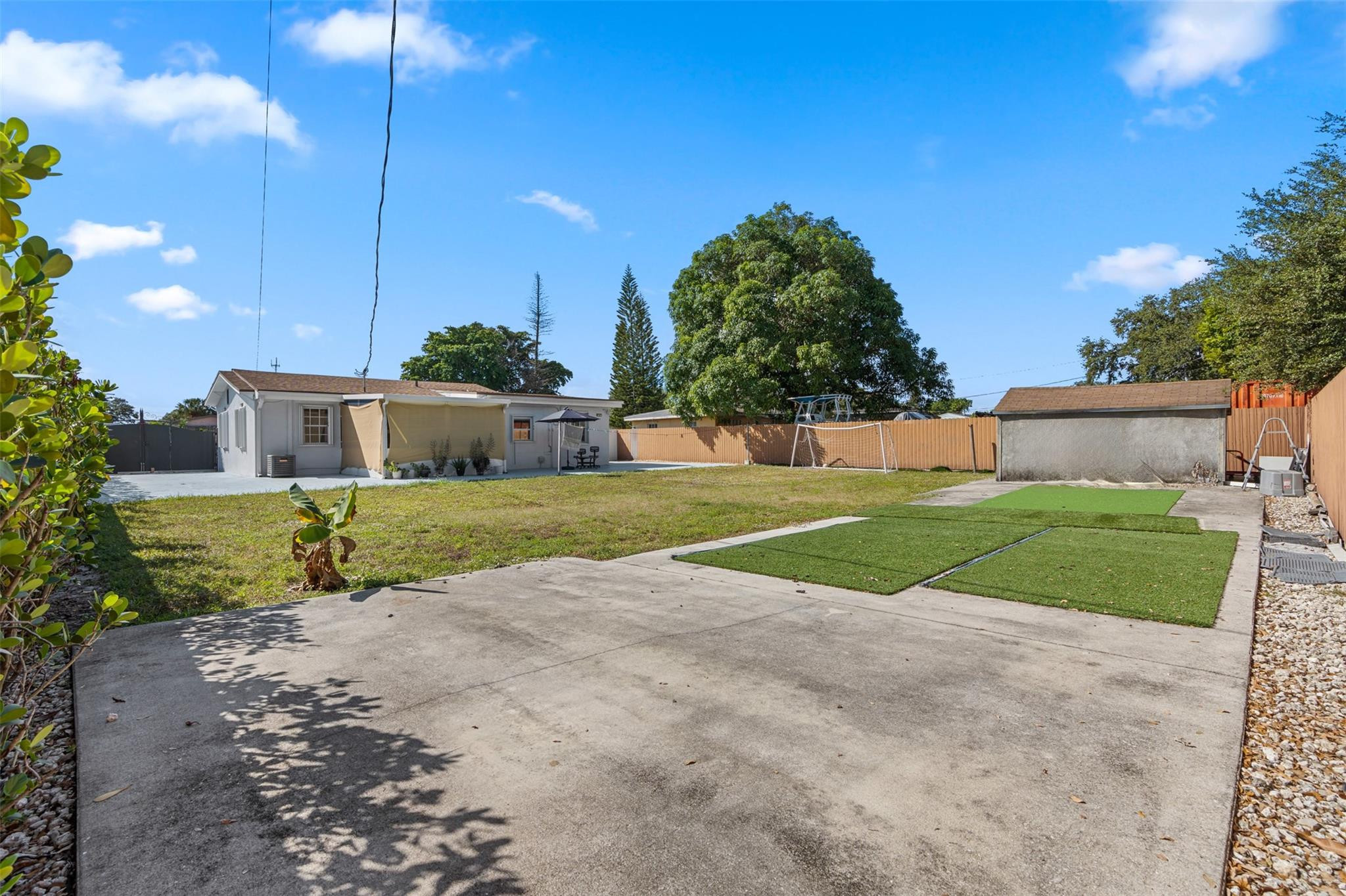 31 Miami Gardens Road West Park, FL 33023 - Photo 27 of 36 a view of a house with a big yard