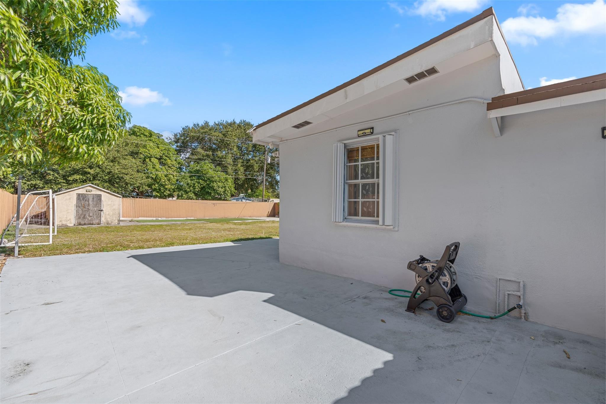 31 Miami Gardens Road West Park, FL 33023 - Photo 30 of 36 a view of a house with a backyard