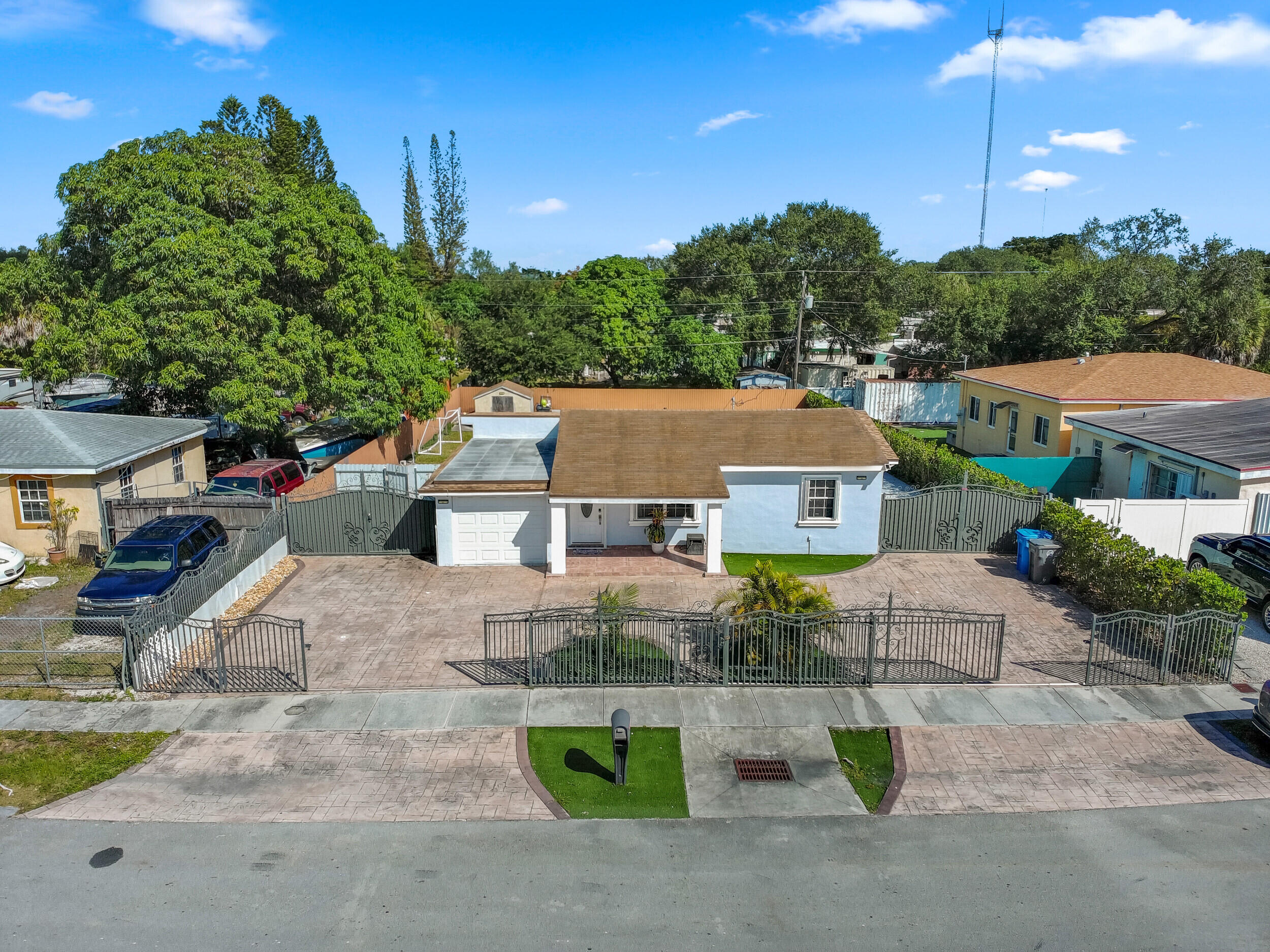 31 Miami Gardens Road West Park, FL 33023 - Photo 32 of 36 a aerial view of a house with a yard