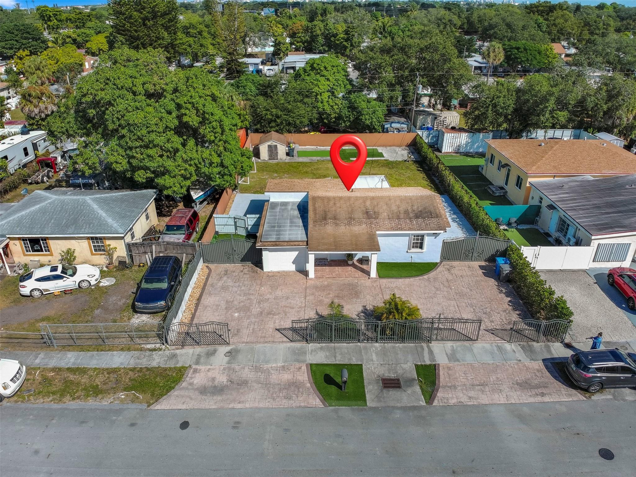 31 Miami Gardens Road West Park, FL 33023 - Photo 33 of 36 an aerial view of a tennis ground