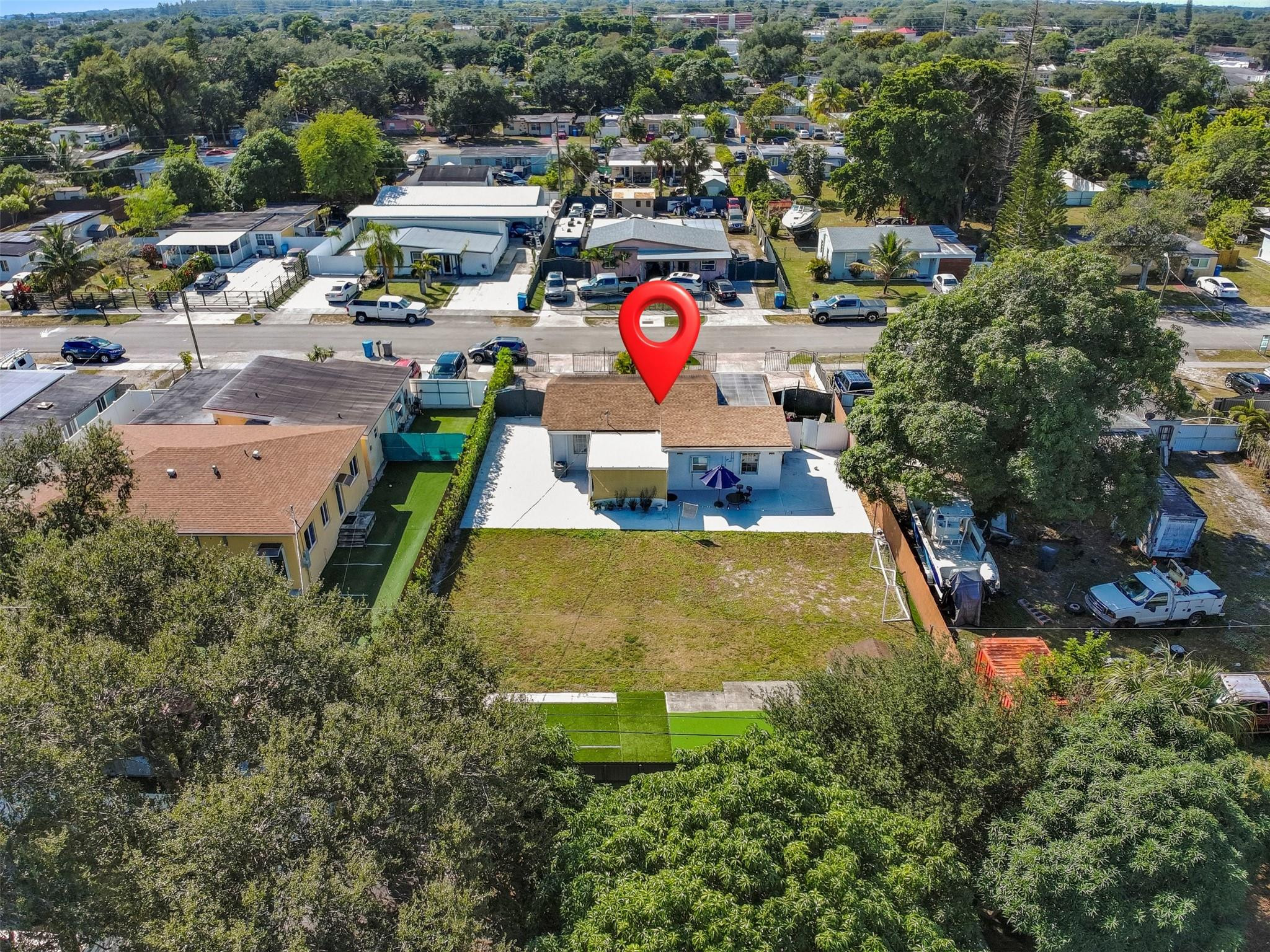 31 Miami Gardens Road West Park, FL 33023 - Photo 34 of 36 an aerial view of a house with swimming pool