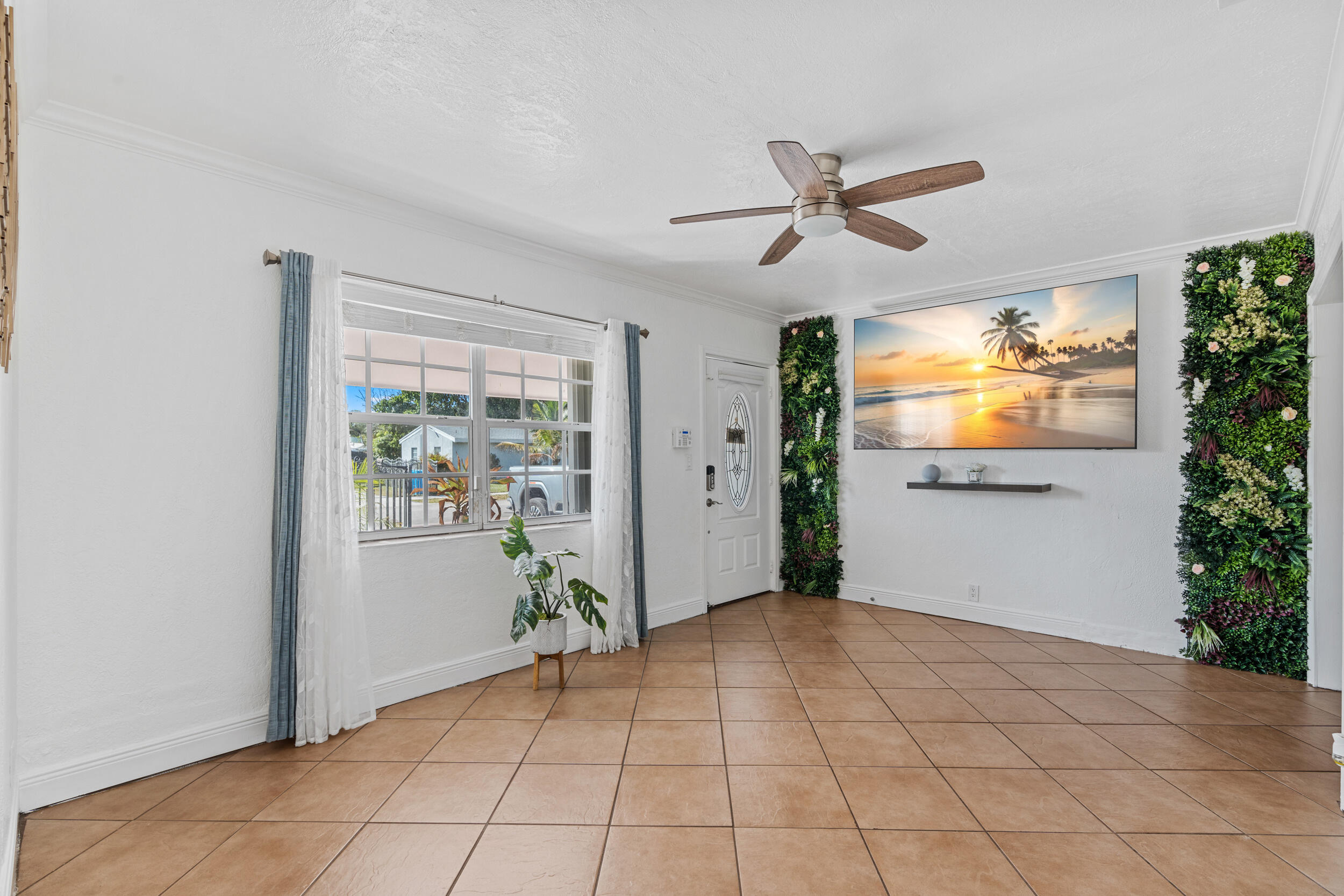 31 Miami Gardens Road West Park, FL 33023 - Photo 4 of 36 a view of an empty room and window