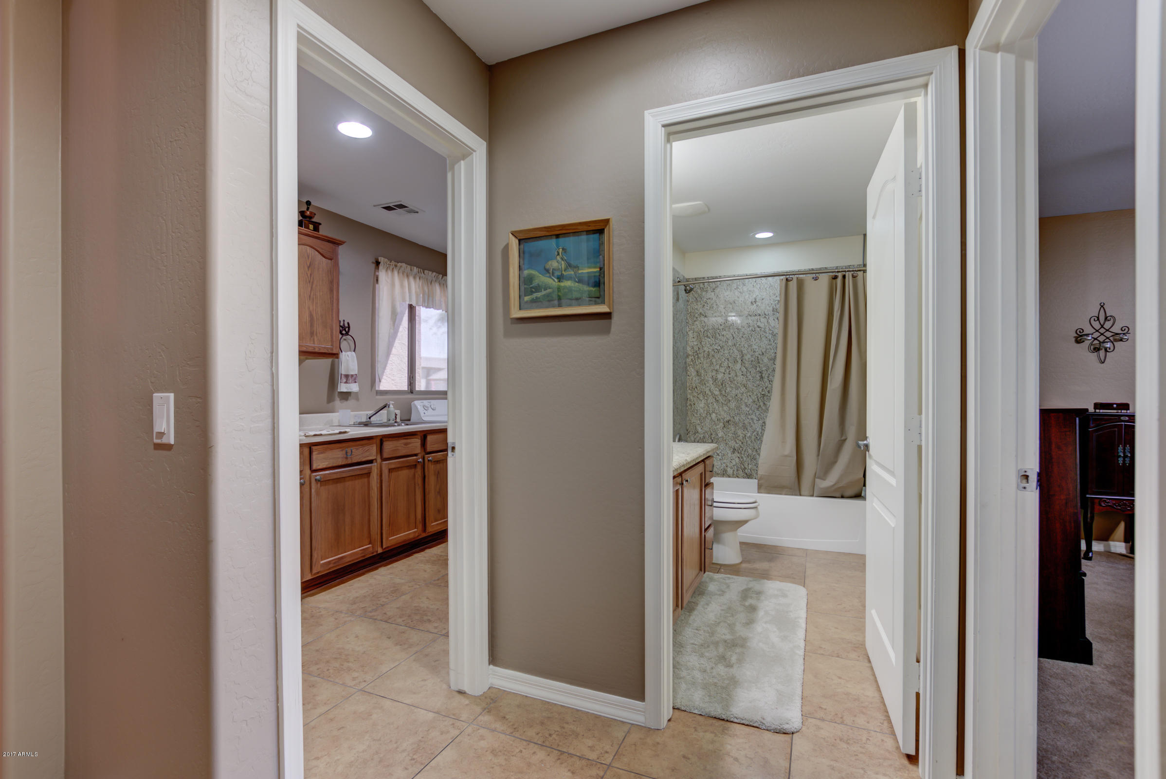 21120 West Sleepy Ranch Road Wittmann, AZ 85361 - Photo 33 of 66 HALL TO LAUNDRY AND BATH 2