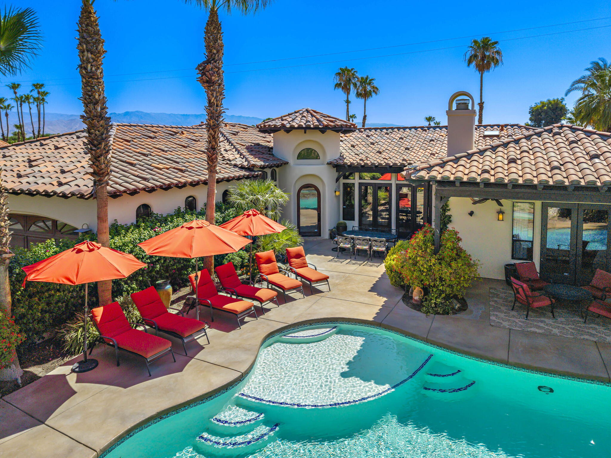 42590 Sandy Bay Road Bermuda Dunes, CA 92203 - Photo 1 of 45 swimming pool with an outdoor seating