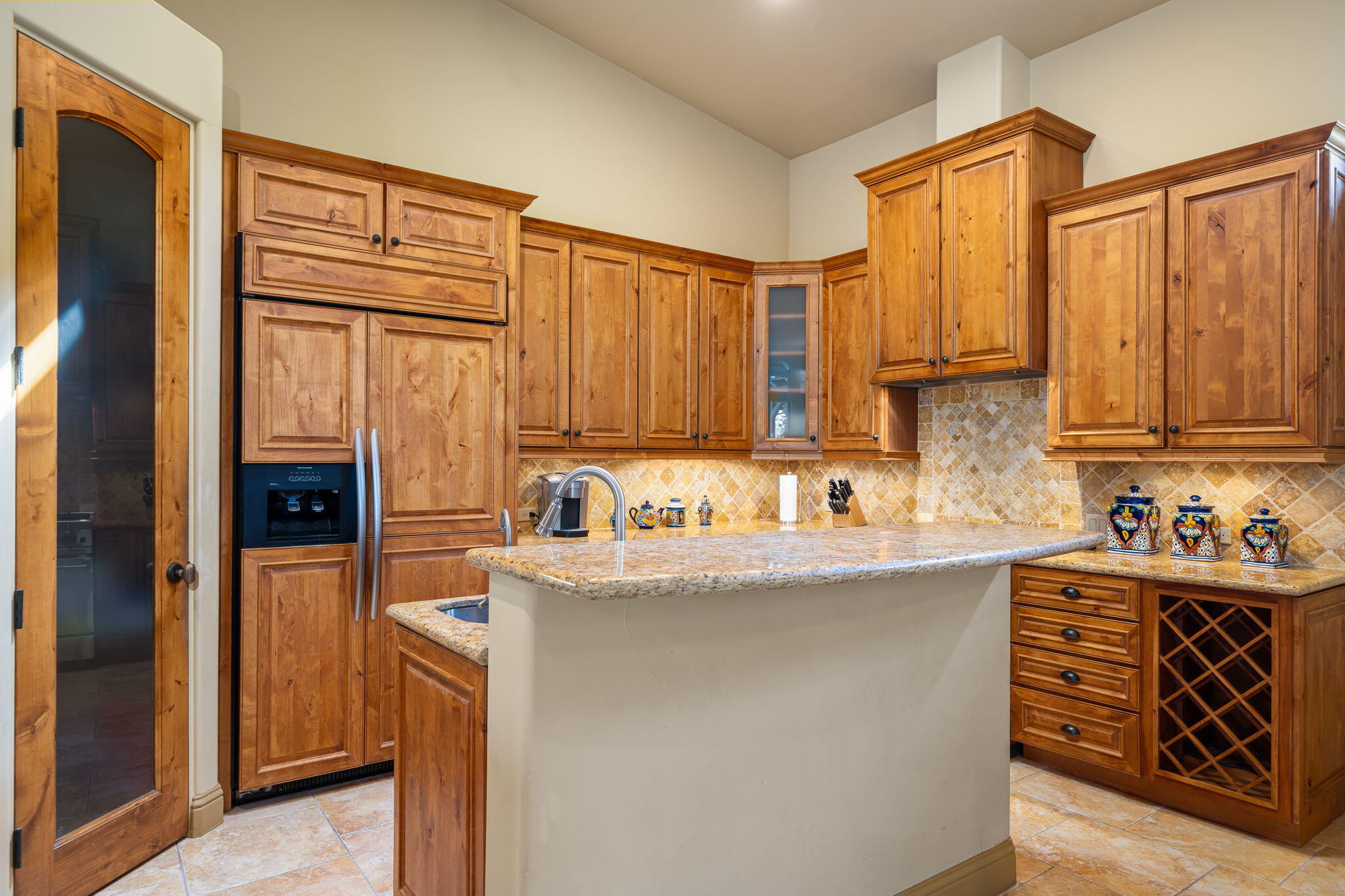 42590 Sandy Bay Road Bermuda Dunes, CA 92203 - Photo 13 of 45 a kitchen with stainless steel appliances granite countertop a sink stove and refrigerator
