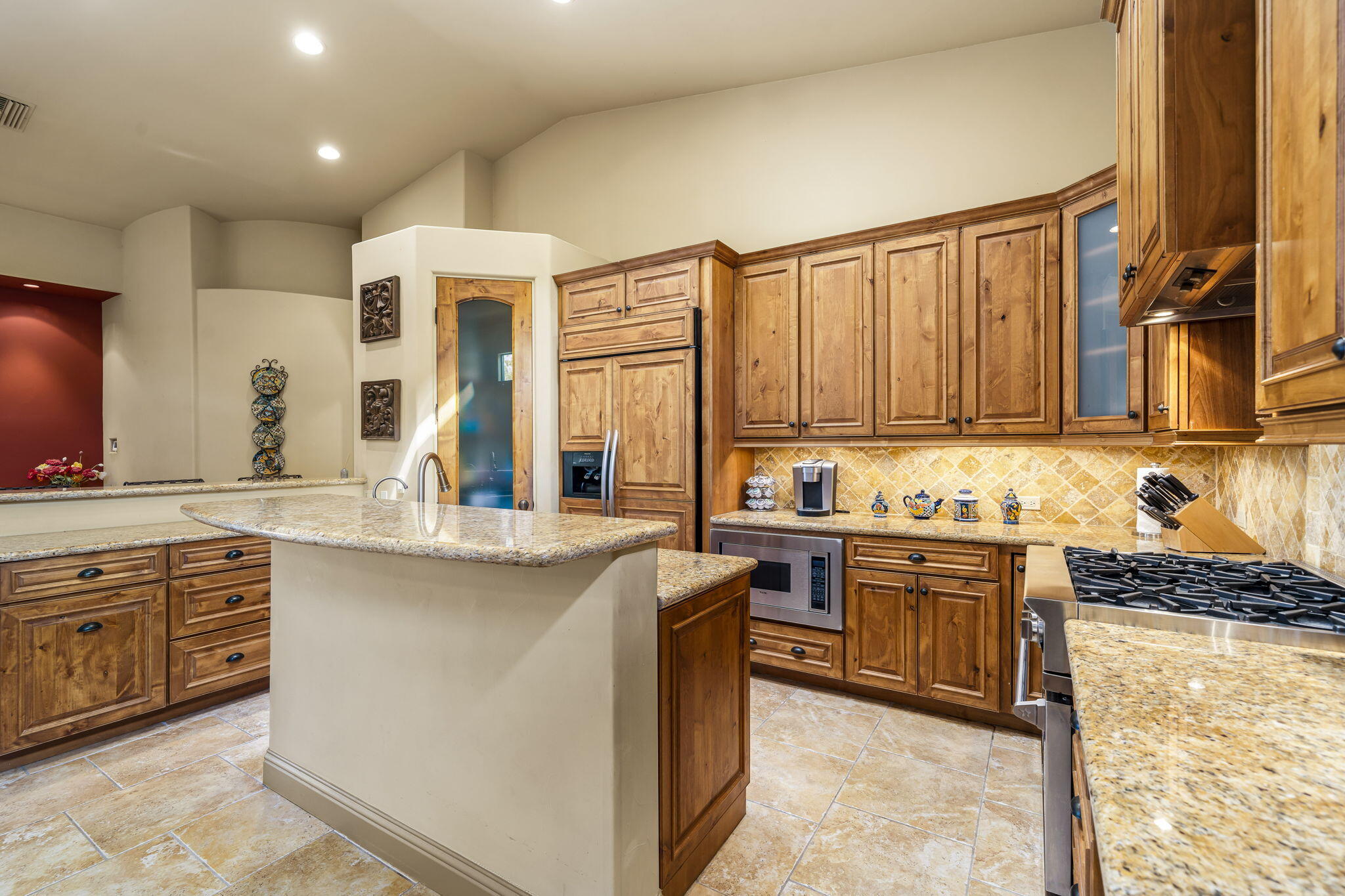 42590 Sandy Bay Road Bermuda Dunes, CA 92203 - Photo 14 of 45 a kitchen with stainless steel appliances granite countertop a stove a sink and a microwave
