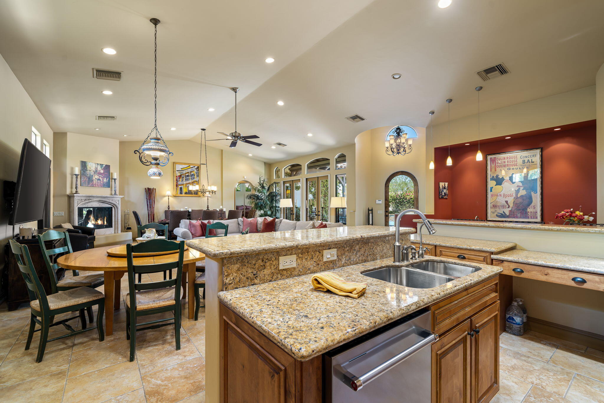 42590 Sandy Bay Road Bermuda Dunes, CA 92203 - Photo 15 of 45 a kitchen with a sink a counter top space and living room view
