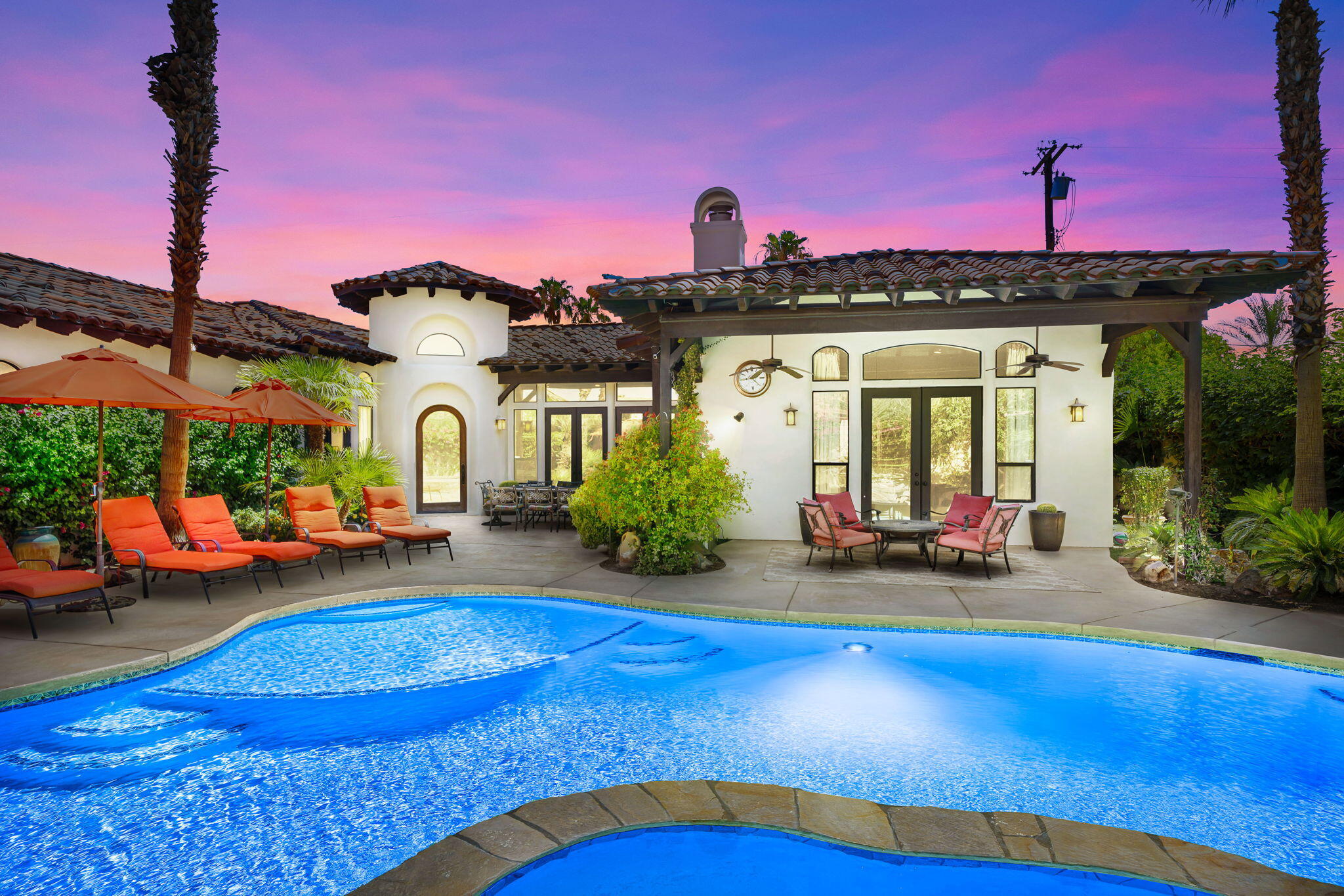 42590 Sandy Bay Road Bermuda Dunes, CA 92203 - Photo 2 of 45 a view of a house with swimming pool and sitting area
