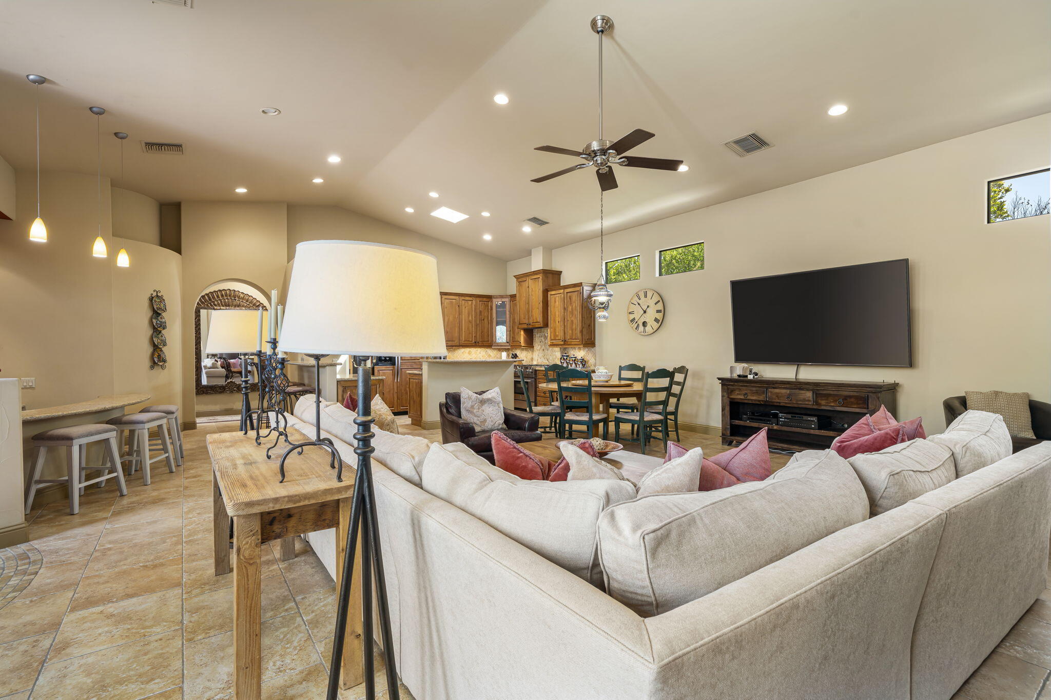 42590 Sandy Bay Road Bermuda Dunes, CA 92203 - Photo 23 of 45 a living room with furniture and a flat screen tv