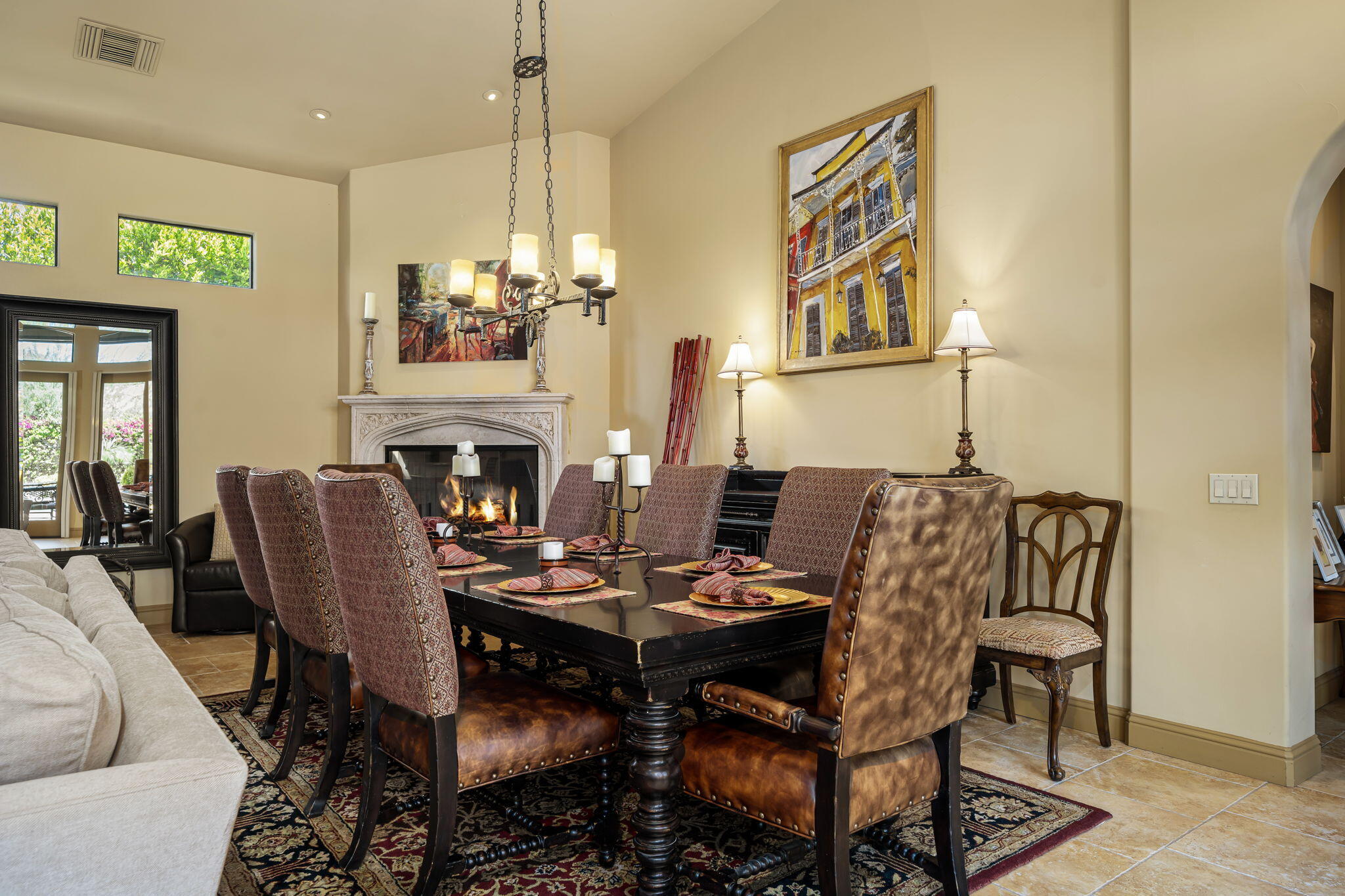 42590 Sandy Bay Road Bermuda Dunes, CA 92203 - Photo 24 of 45 a view of a dining room with furniture a chandelier and wooden floor