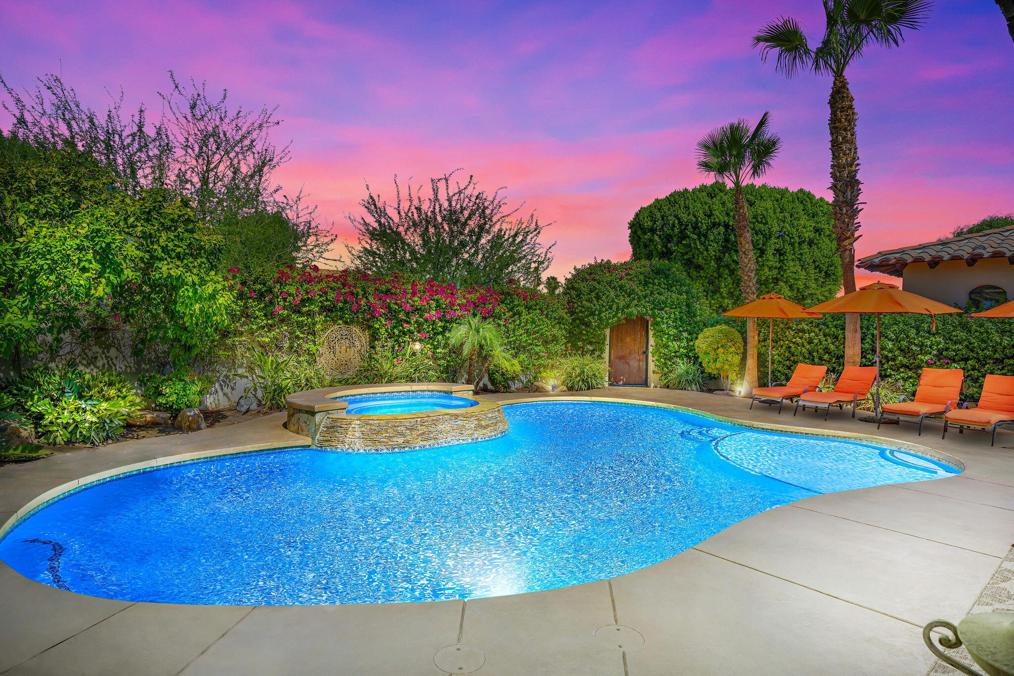 42590 Sandy Bay Road Bermuda Dunes, CA 92203 - Photo 3 of 45 a view of a swimming pool with an outdoor space and seating area