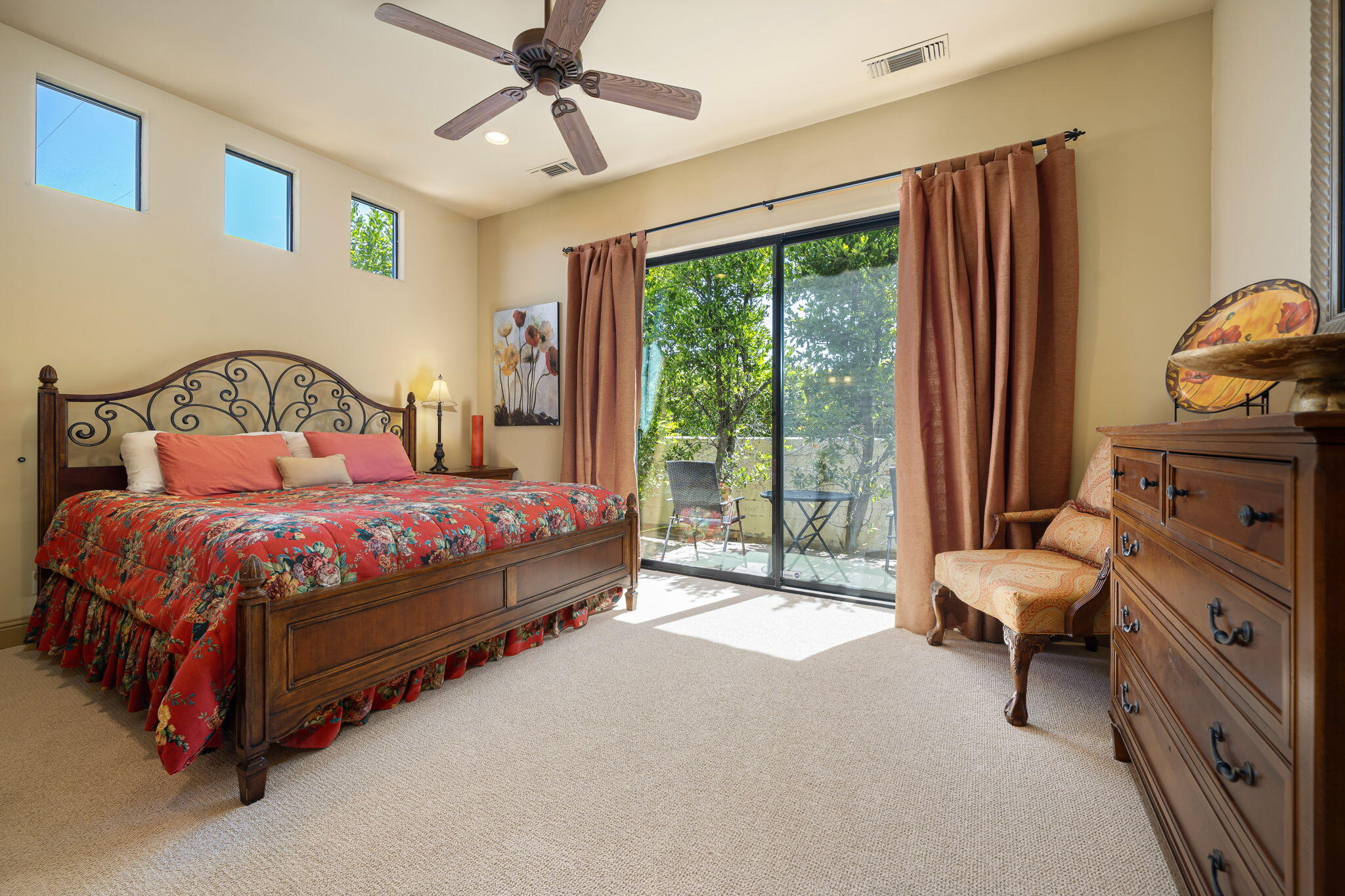 42590 Sandy Bay Road Bermuda Dunes, CA 92203 - Photo 34 of 45 a bedroom with a bed chair and a large window