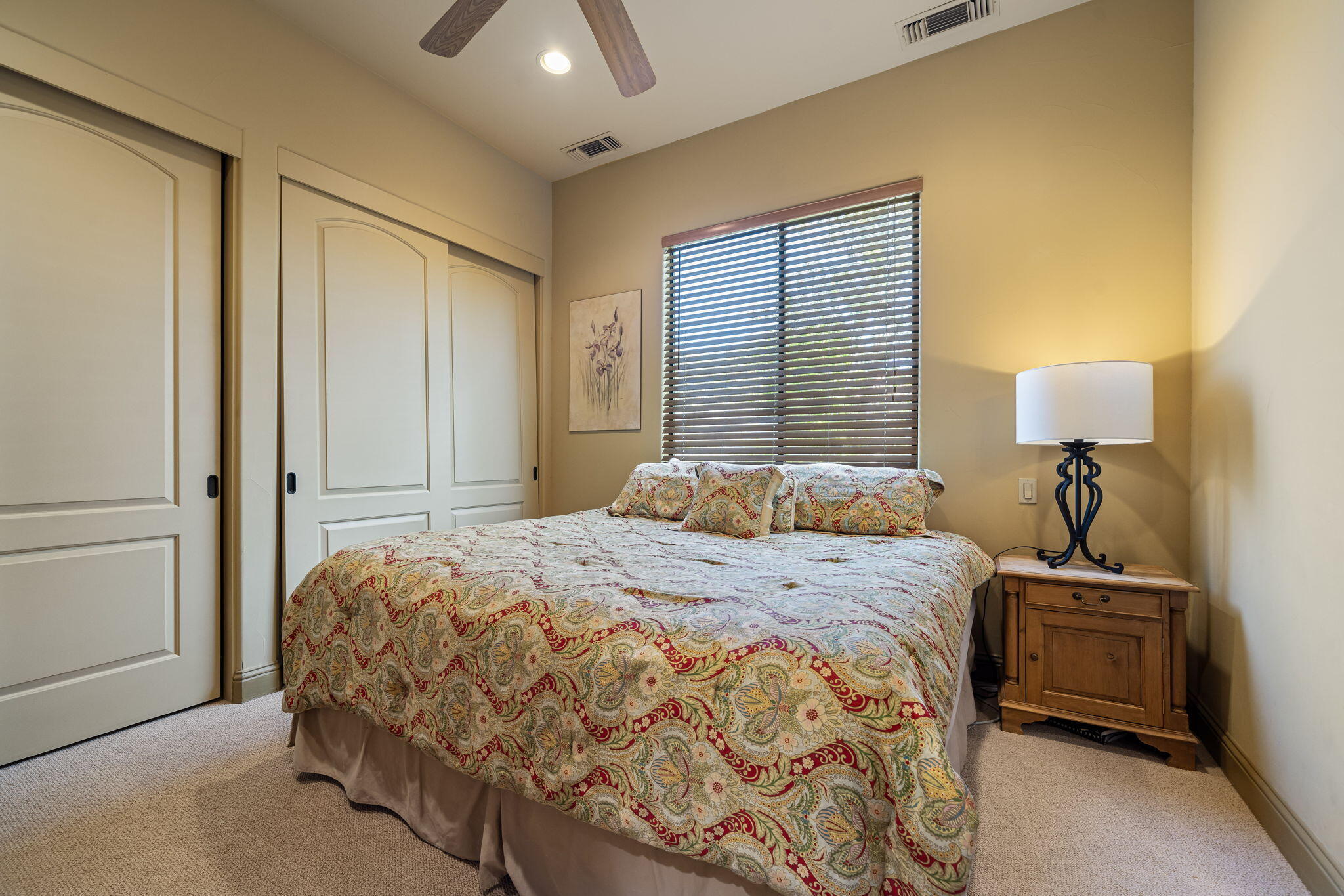 42590 Sandy Bay Road Bermuda Dunes, CA 92203 - Photo 36 of 45 a bedroom with a bed and a lamp