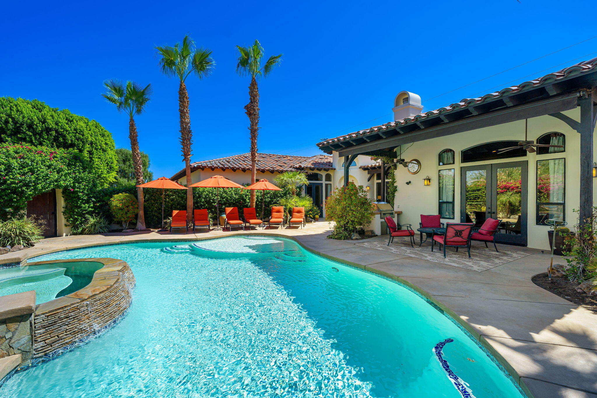 42590 Sandy Bay Road Bermuda Dunes, CA 92203 - Photo 7 of 45 a view of a house with patio