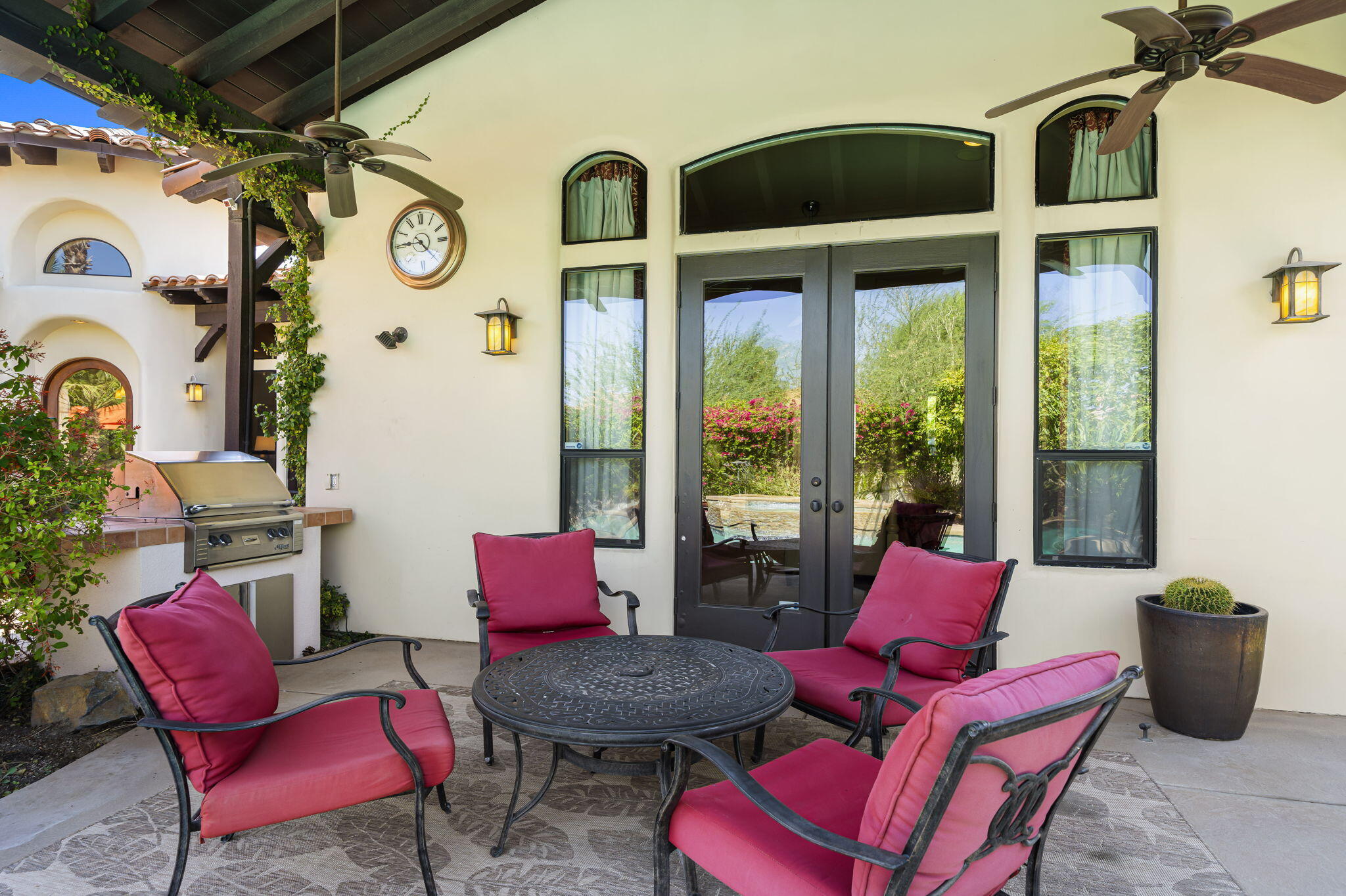 42590 Sandy Bay Road Bermuda Dunes, CA 92203 - Photo 8 of 45 a living room with furniture and a large window