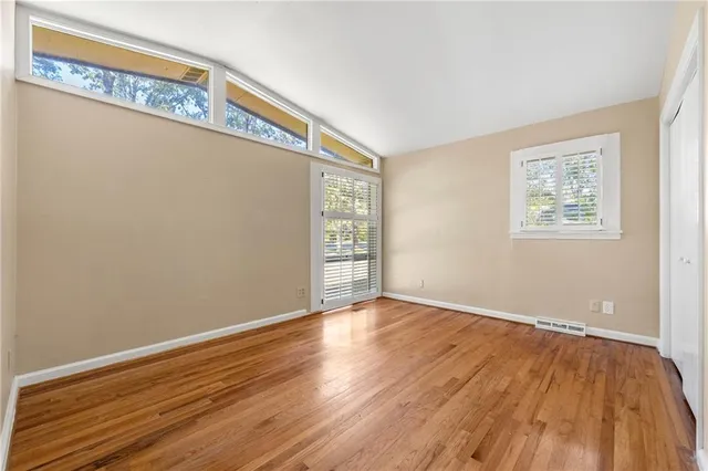 a view of a backyard with sitting area