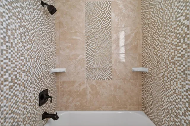 a very nice looking living room with a large window