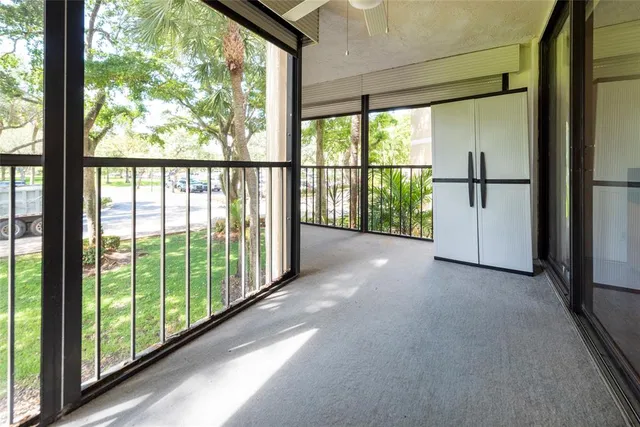 a view of a city street from a balcony