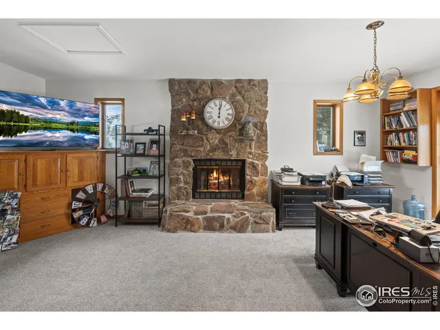 a bathroom with a toilet a sink and a window