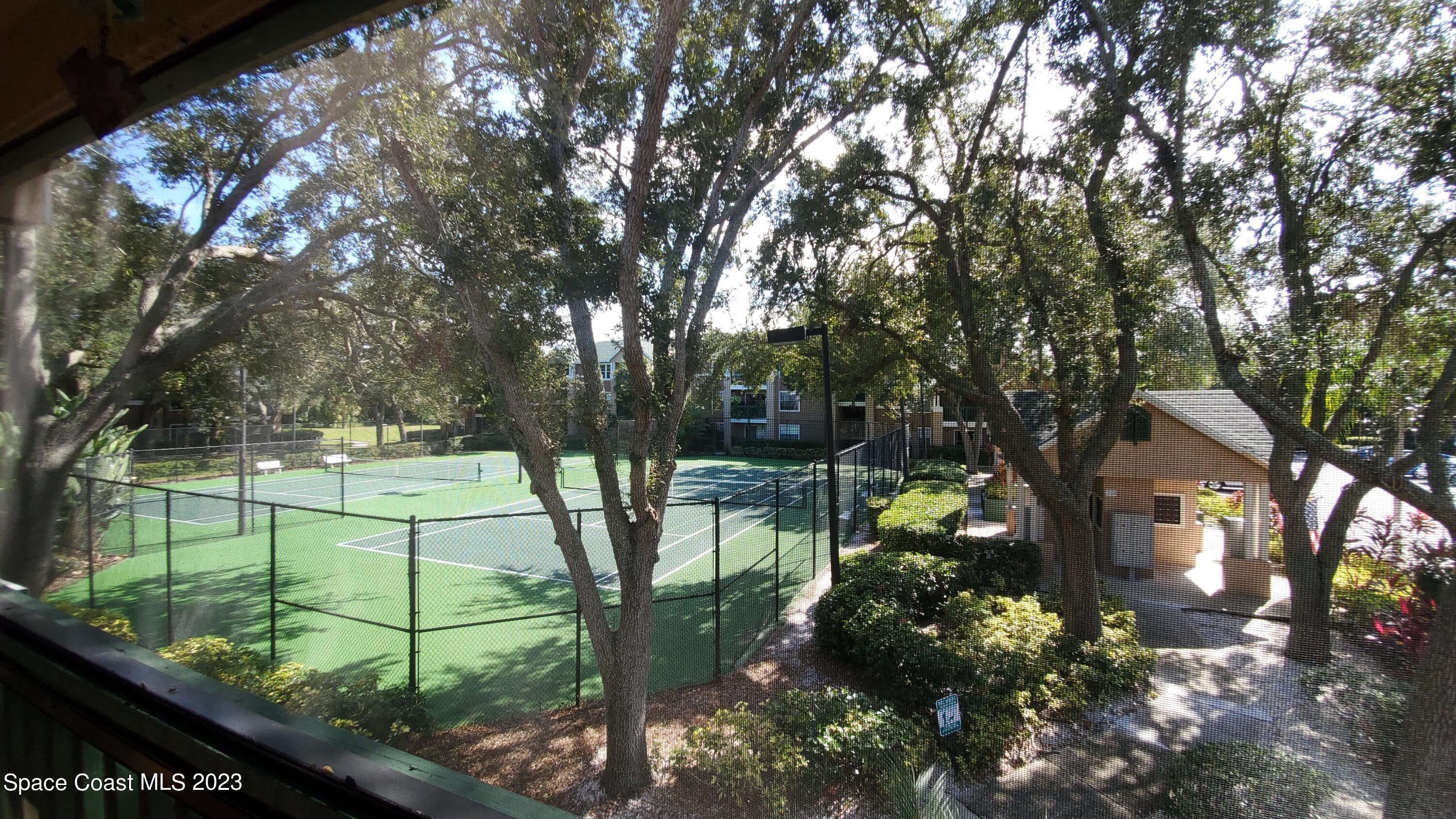 7667 North Wickham Road, Unit 916 Melbourne, FL 32940 - Photo 24 of 53 a view of a garden
