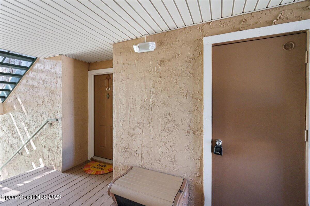 7667 North Wickham Road, Unit 916 Melbourne, FL 32940 - Photo 3 of 53 a view of room with wooden floor