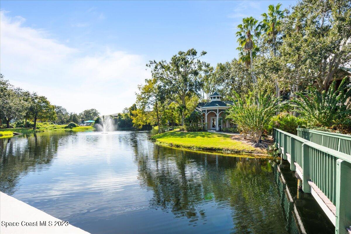 7667 North Wickham Road, Unit 916 Melbourne, FL 32940 - Photo 53 of 53 a view of a lake with a outdoor space