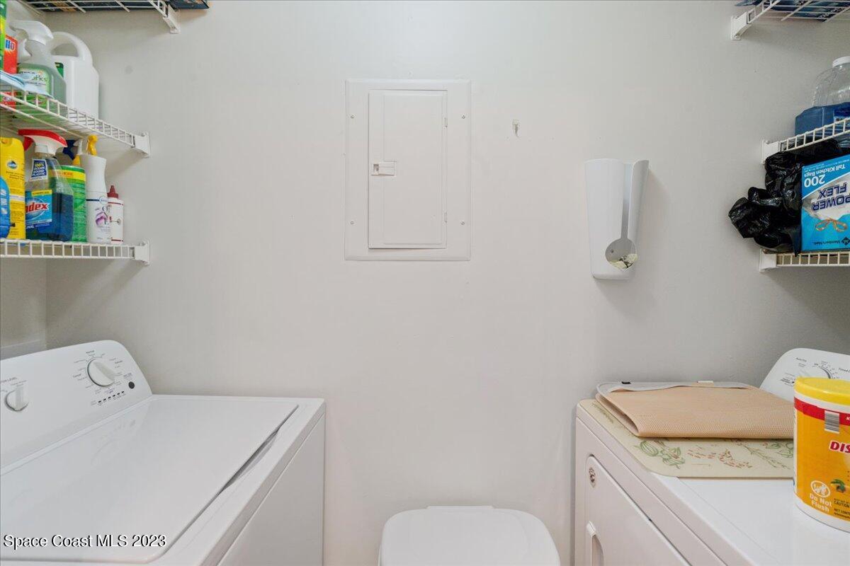 7667 North Wickham Road, Unit 916 Melbourne, FL 32940 - Photo 6 of 53 a utility room with dryer and washer