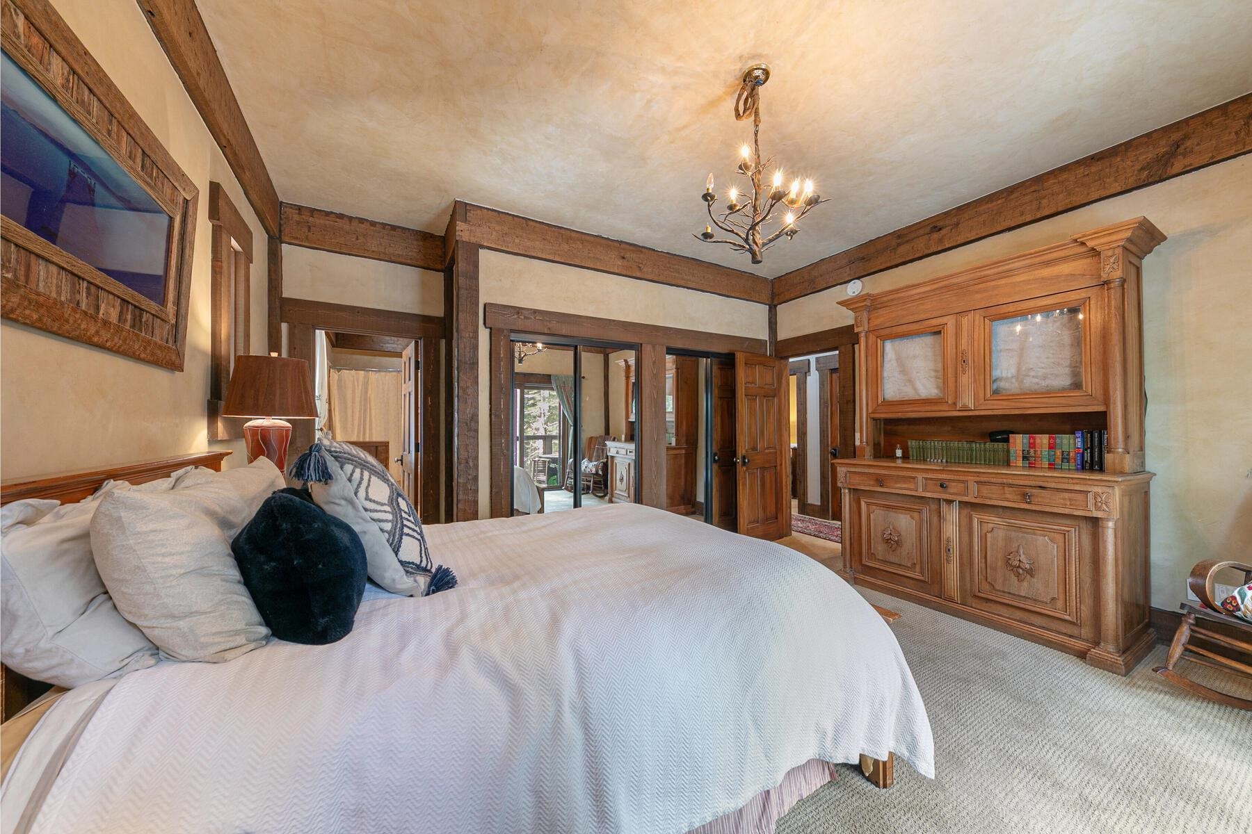 12209 Greenleaf Way Truckee, CA 96161 - Photo 15 of 28 a bedroom with a large bed and a dresser